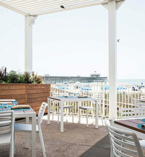 outdoor dining area at beachfront restaurant