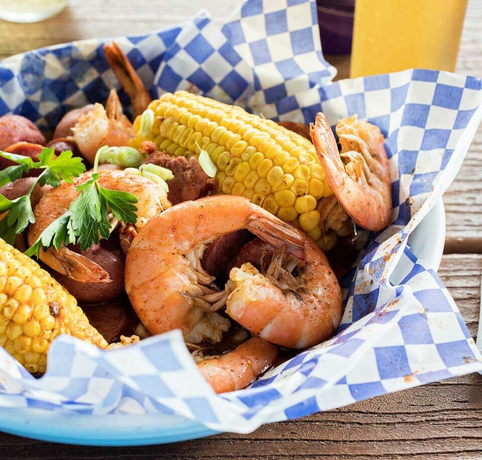 shrimp, corn on the cob and potato dish