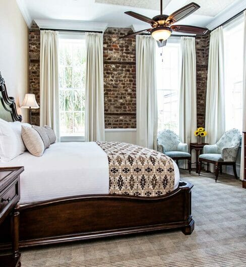 king suite in brick wall hotel room