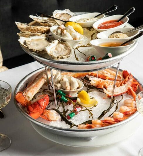 seafood tower with lobster shrimp and oysters
