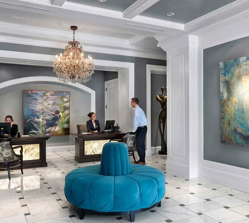 Large circular seating chair in center of hotel lobby