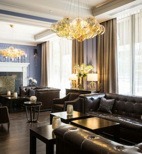 lobby bar lounge with leather couches and large chandelier